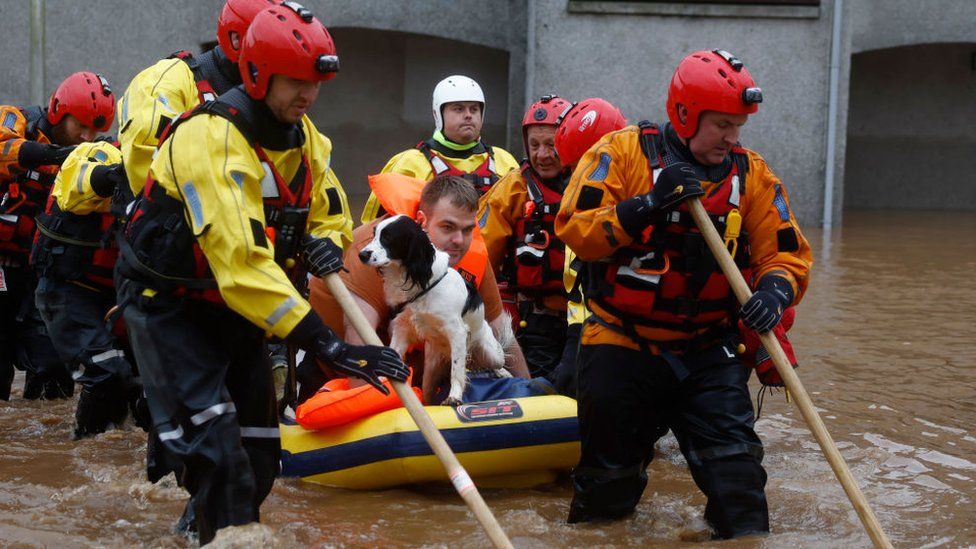 Rescue teams helped people leave their flooded homes in Brechin on Friday