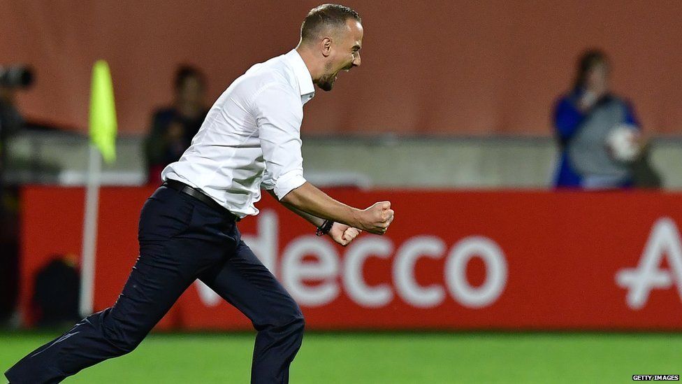 England manager Mark Sampson celebrates after the game