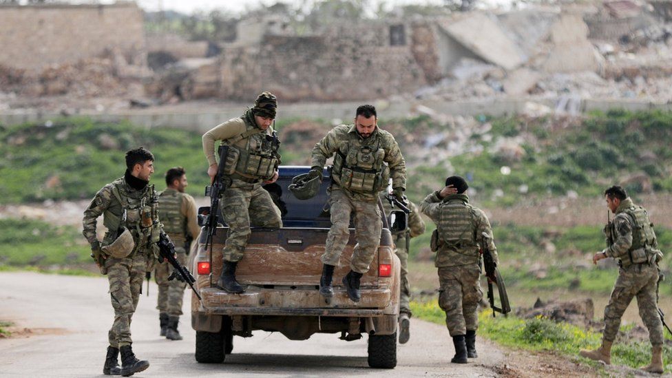 Turkish-backed Syrian rebel fighters in Maryamayn, in the eastern Afrin region (11 March 2018)