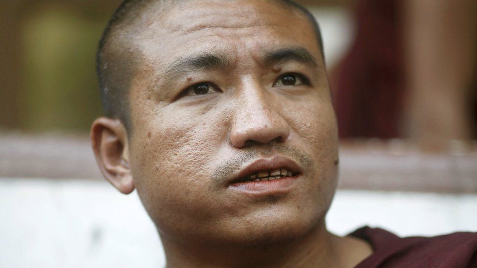 File photo of Shin Gambira, leader of the All-Burmese Monks Alliance, talking to supporters while attending a court hearing in Yangon