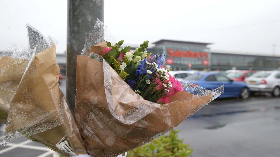 Floral tributes left at scene of shooting