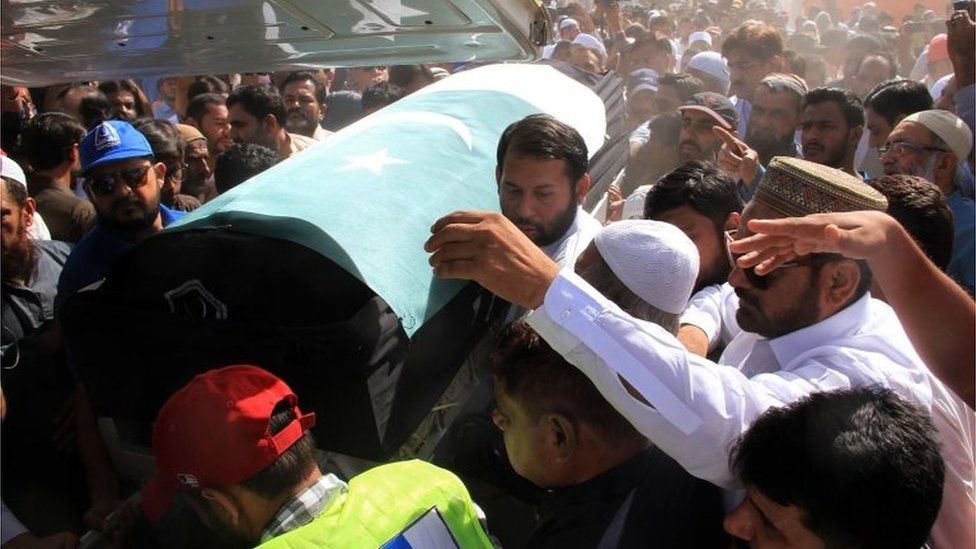 Relatives and residents carry the coffin of slain Pakistani exchange student Sabika Sheikh, who was killed during a school shooting in Texas, following her body"s arrival from the United States, in Karachi on May 23, 2018
