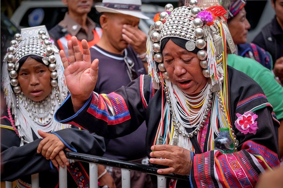 An ethnic Akha shaman perform religious rituals in order to help finding the missing children and their coach at Khun Nam Nang Non Forest Park