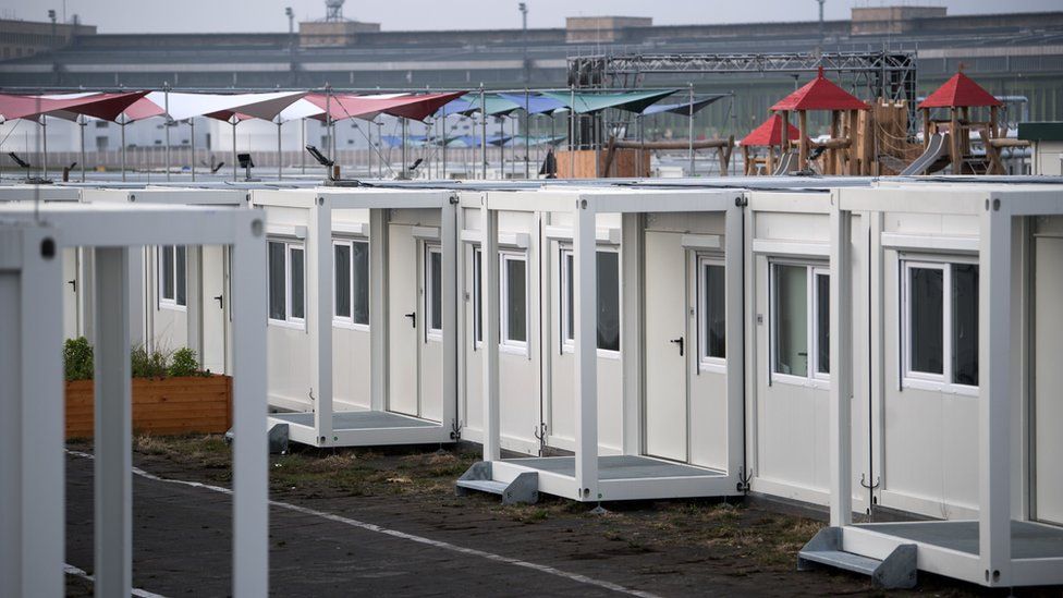 Container homes for asylum seekers are pictured at the Tempelhofer Feld former airport in Berlin, on 1 December, 2017.