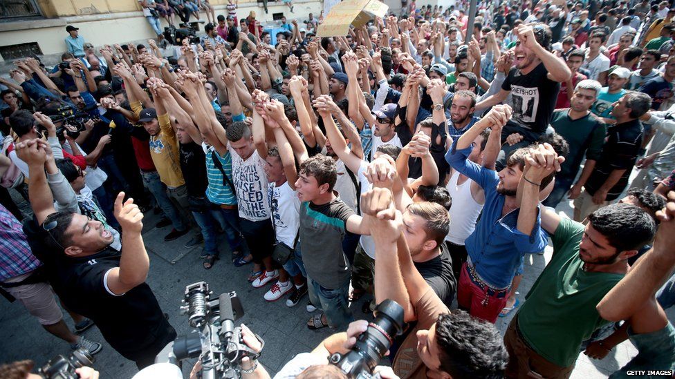 Syrian and Afghan refugees demanded the right to travel to Germany at Keleti (East) railway station in Budapest