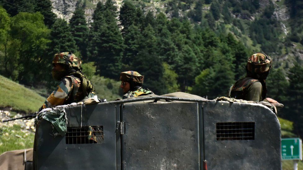 Indian arm officers stand atop a paraillitary vehicle at Gagangeer area of Ganderbal district as the standoff escilates on 07 September 2020