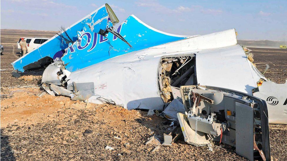 Debris from crashed Russian jet lies strewn across the sand at the site of the crash, Sinai, Egypt, 31 October 2015