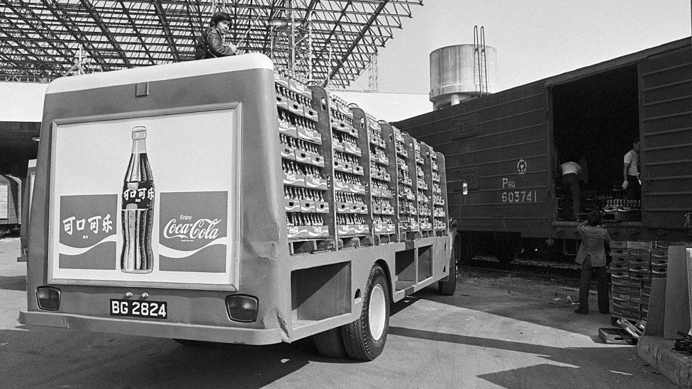 Coca-Cola being loaded onto a train in Hong Kong in 1979