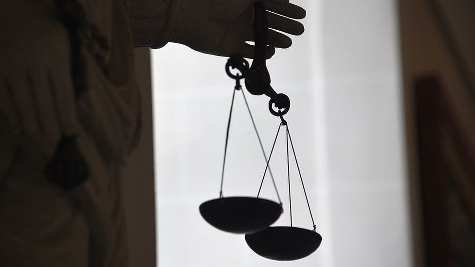 A statue of the goddess of Justice balancing the scales is seen at Rennes' courthouse, France, in May 2015