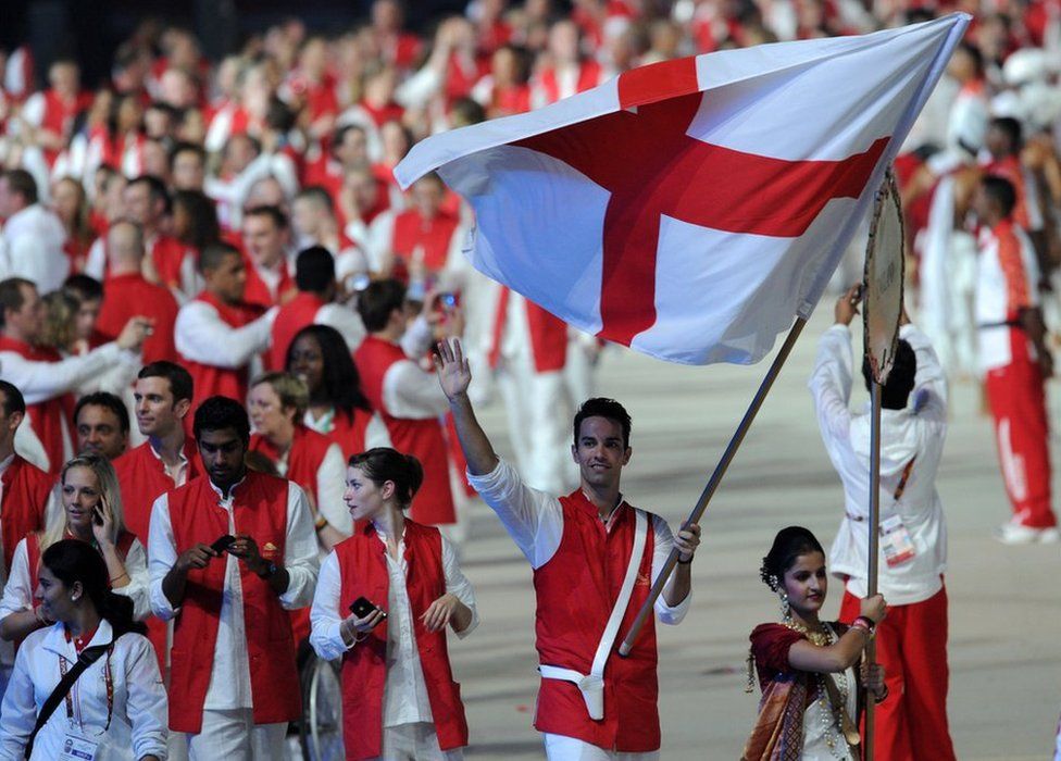 England athletes led by flagbearer Nathan Robertson take part in the opening ceremony of the XIX Commonwealth Games in New Delhi on October 3, 2010