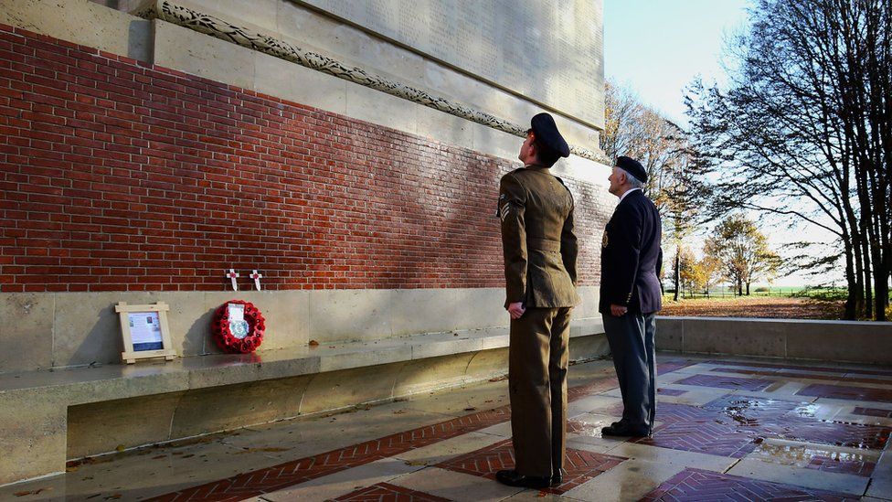 Steve Kelliher (left) of the Army Medical Corps and World War II veteran Thomas Gurley laid a wreath