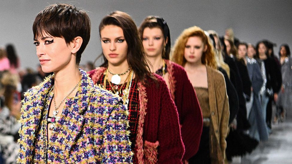 Chanel Metiers d'Art: Models turn Manchester street into a catwalk - BBC  News