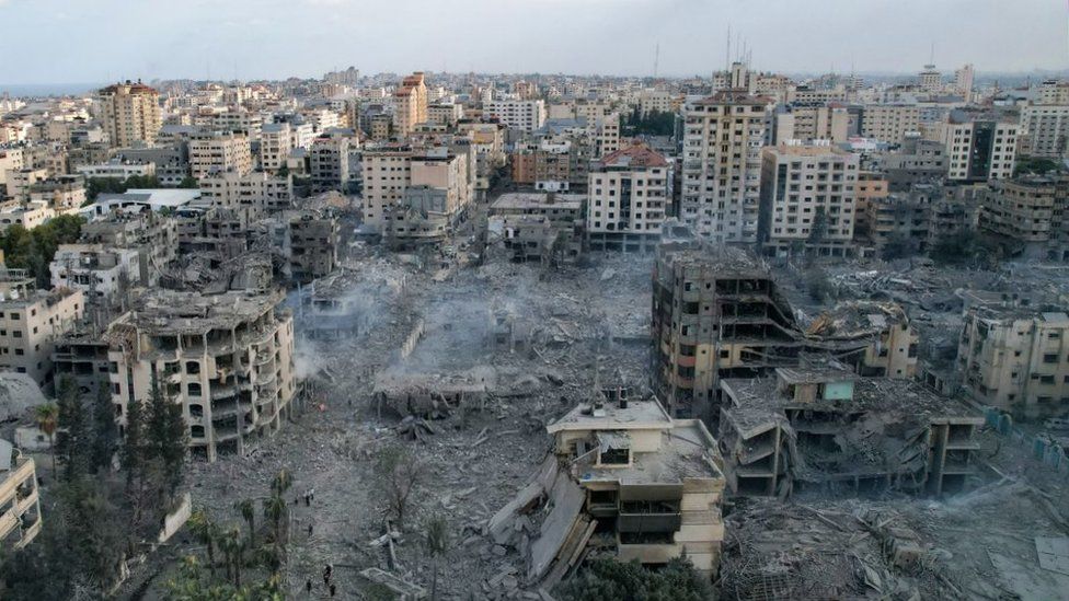 Heavily damaged buildings are seen in an aerial view of Gaza City following Israeli airstrikes on October 10, 2023.