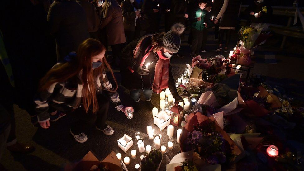 Well wishers leave candles in memory of Ashling Murphy near the scene of her murder in Tullamore