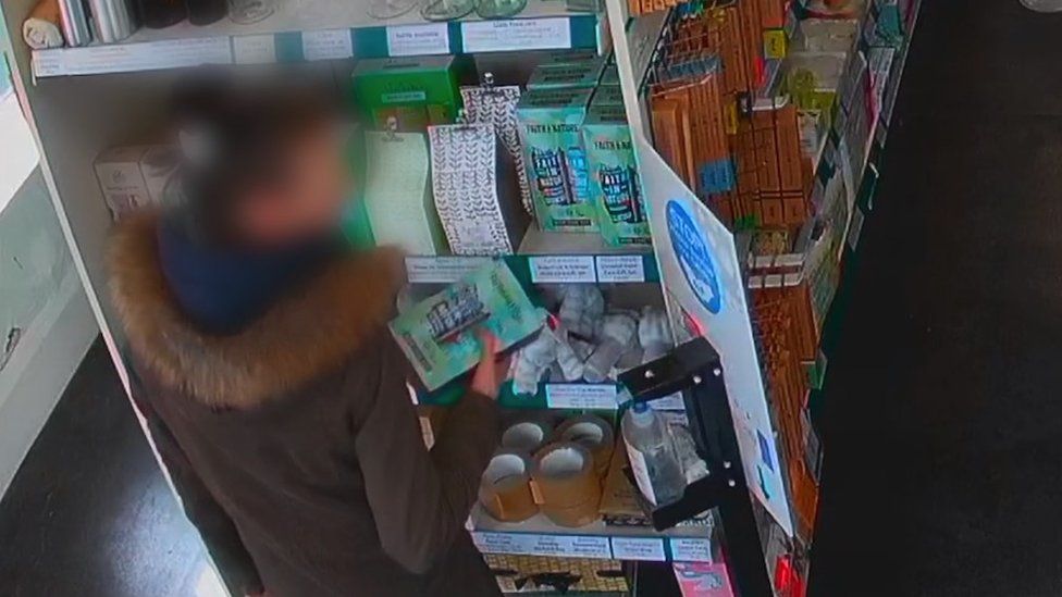 CCTV images of thieves in Adrian Bhagat's shop, in Nottingham