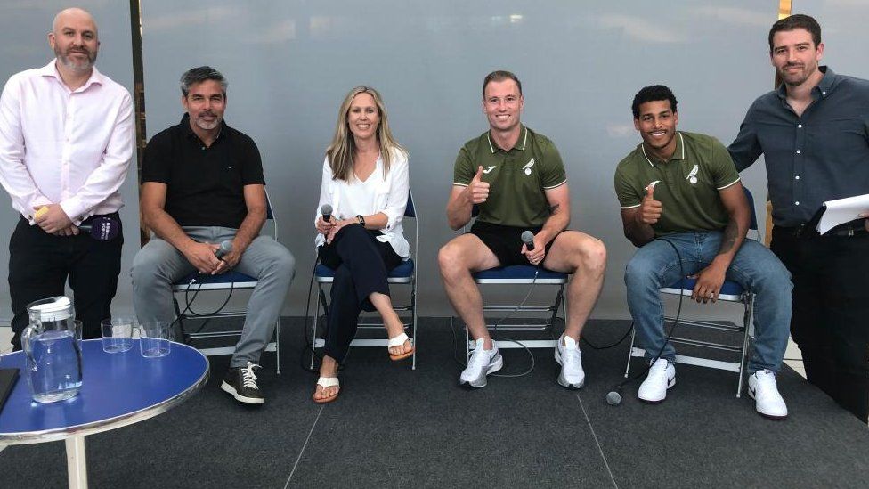 Zoe Webber, centre, with members from Norwich City and BBC Radio Norfolk