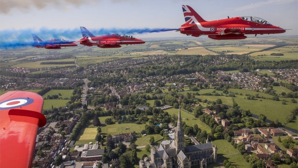Armed Forces Day is marked by a Red Arrows flypast over Salisbury Cathedral.
