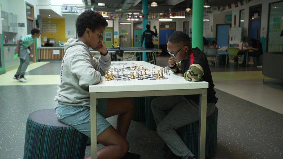 Children play chess