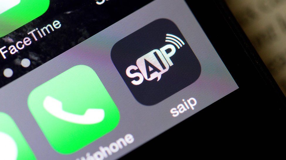 Photo taken on June 8, 2016 shows smartphone with logo of SAIP (Systeme d'Alerte et d'Information aux populations, or Population Alert and Information System)