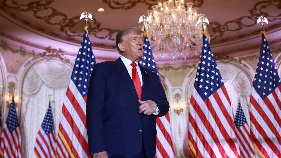 Former US President Donald Trump arrives on stage to speak during an event at his Mar-a-Lago home on November 15, 2022 in Palm Beach, Florida. Trump announced that he was seeking
