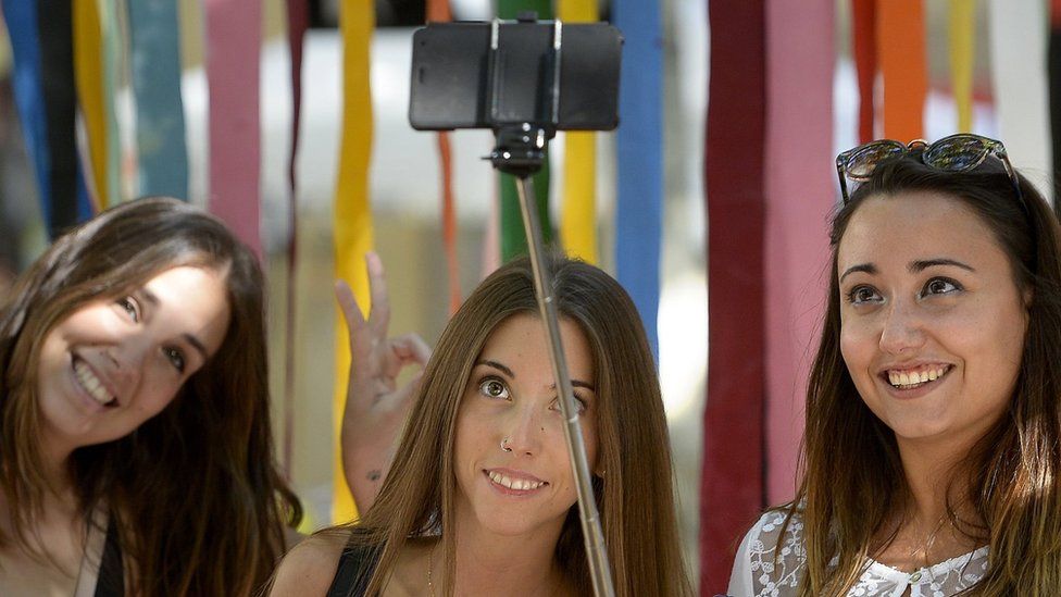 Girls take a selfie in Spain
