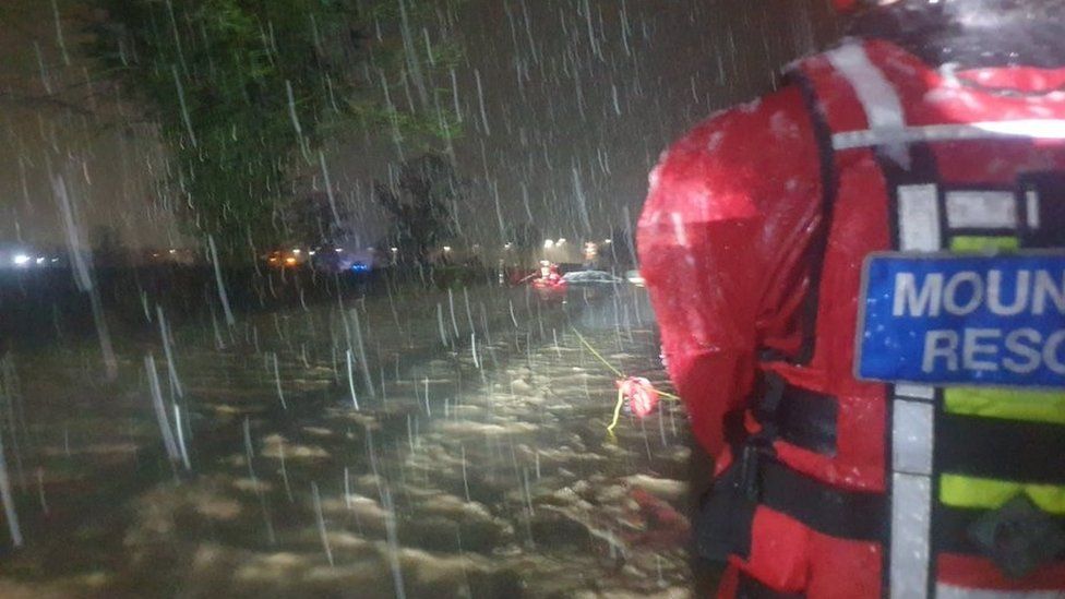North East Wales Search and Rescue Rescue helped people whose homes were flooded in New Broughton, Wrexham