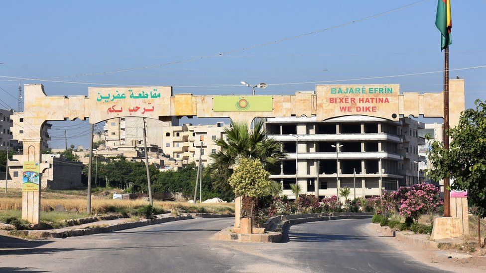 File photo showing main entrance to Syrian town of Afrin (9 June 2017)