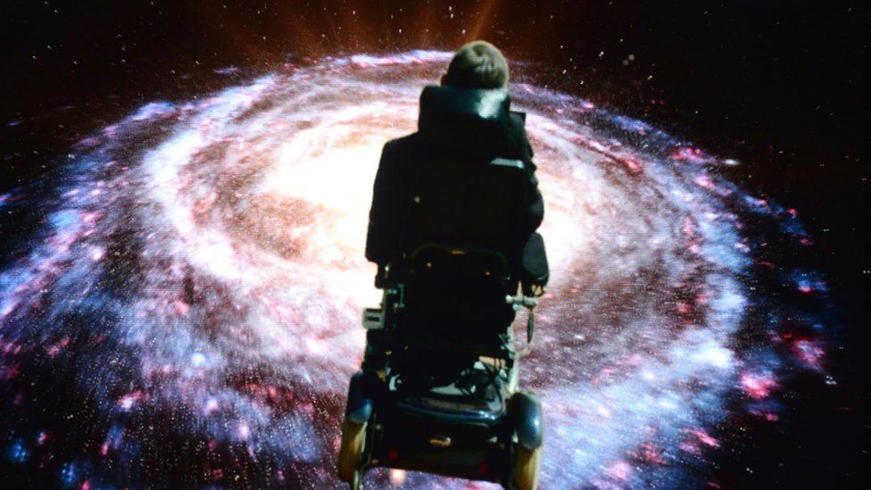 Professor Stephen Hawking superimposed onto an image of a galaxy from Monty Python's tour in 2014
