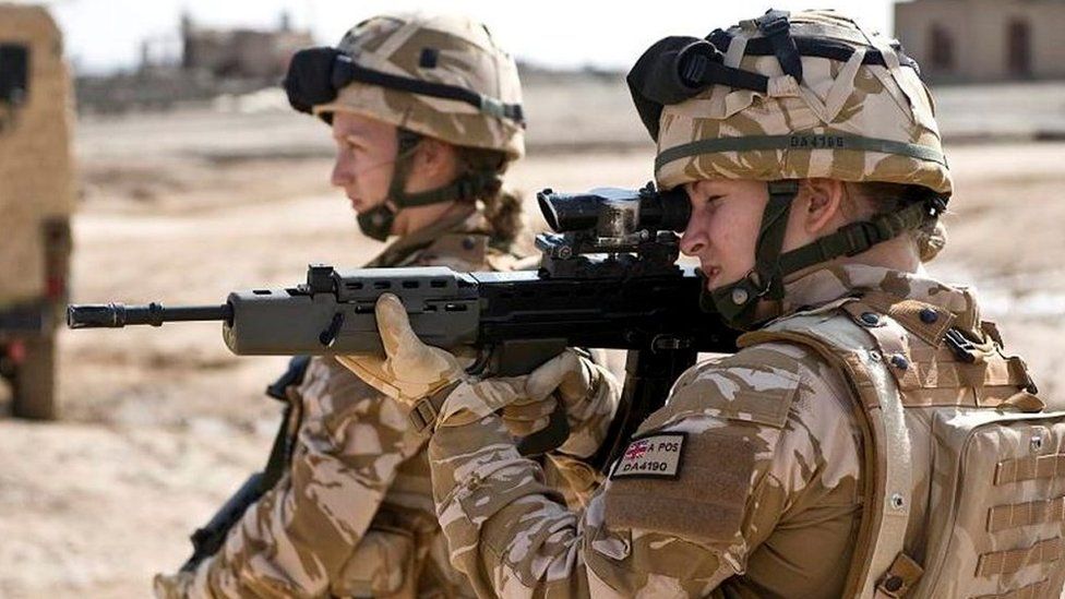 Two female British soldiers on patrol in Lashkar Gah, Afghanistan