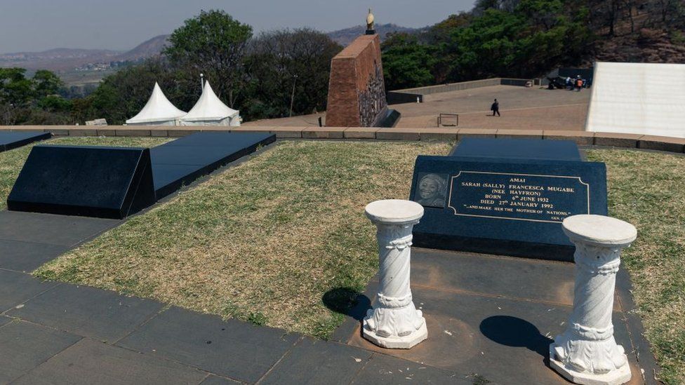A picture taken on September 12, 2019 shows an empty grave next to the grave of late Zimbabwean President's first wife Sally Mugabe, who lies buried at the National Heroes Acre in Harare, as speculations continue as to where the final resting place of the late president Robert Mugabe will be.