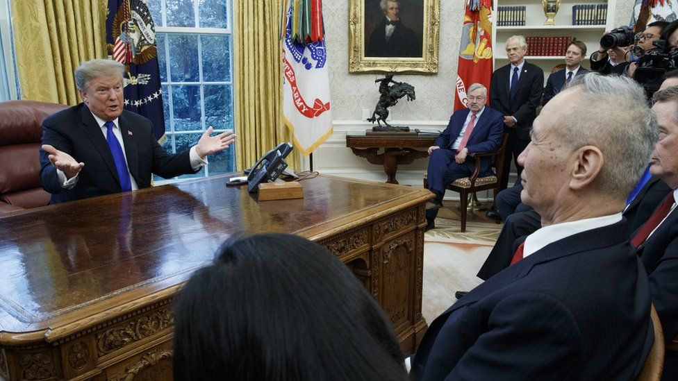 US President Donald J. Trump (L) talks with Vice Premier of the People"s Republic of China Liu He (R) during a meeting in the Oval Office of the White House in Washington, DC, USA, 22 January 2019.