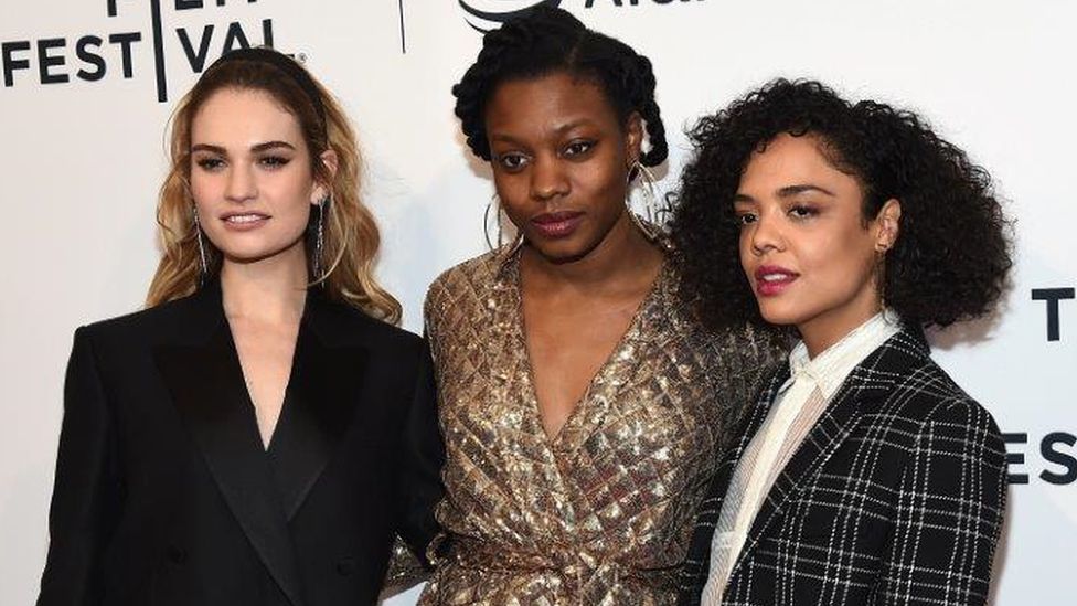 Nia DaCosta (centre) with Lily James and Tessa Thompson