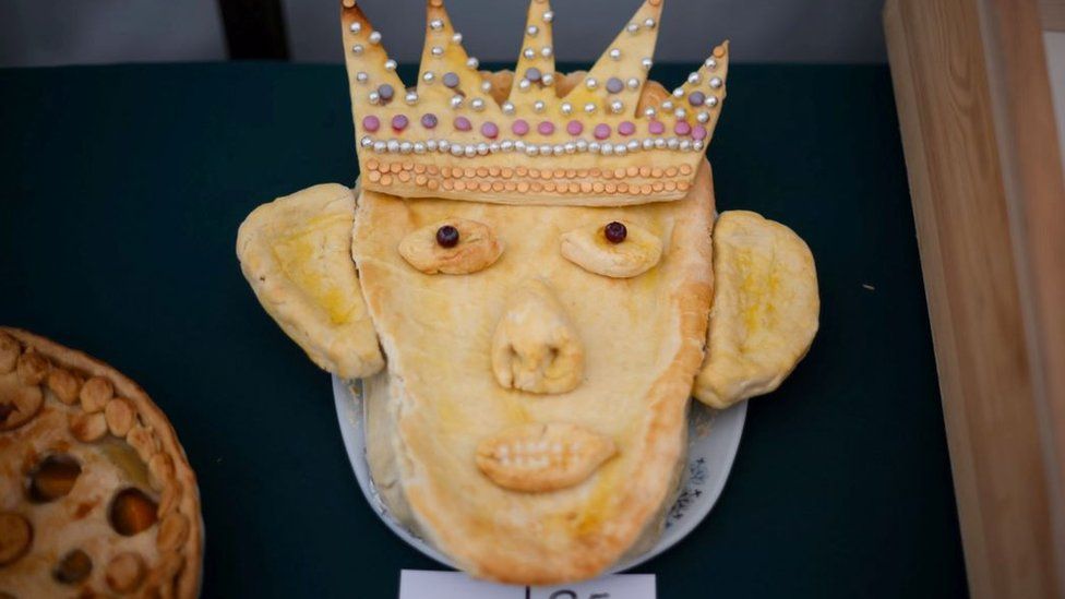 A pie depicting King Charles III on display during the Sandringham Flower Show at Sandringham House in Norfolk