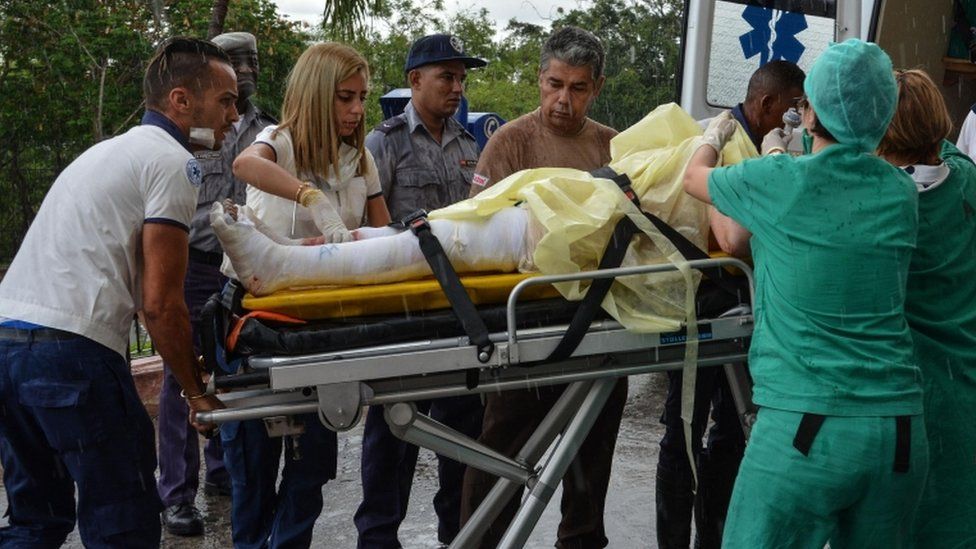 the arrival of a survivor of a plane crash to a hospital in Havana,