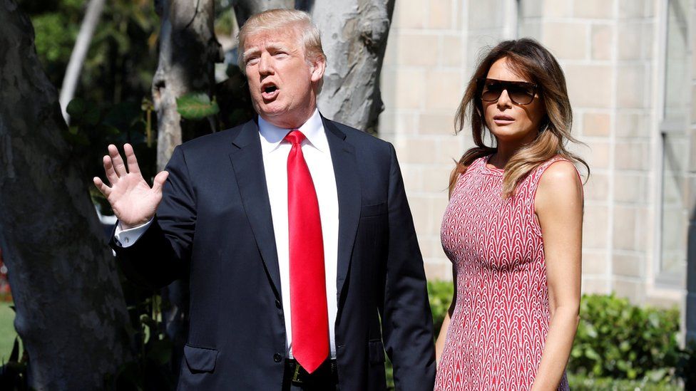 US President Donald Trump talks to reporters about Daca as he arrives with First Lady Melania Trump for the Easter service at Bethesda-by-the-Sea Episcopal Church in Palm Beach, Florida, on 1 April 2018