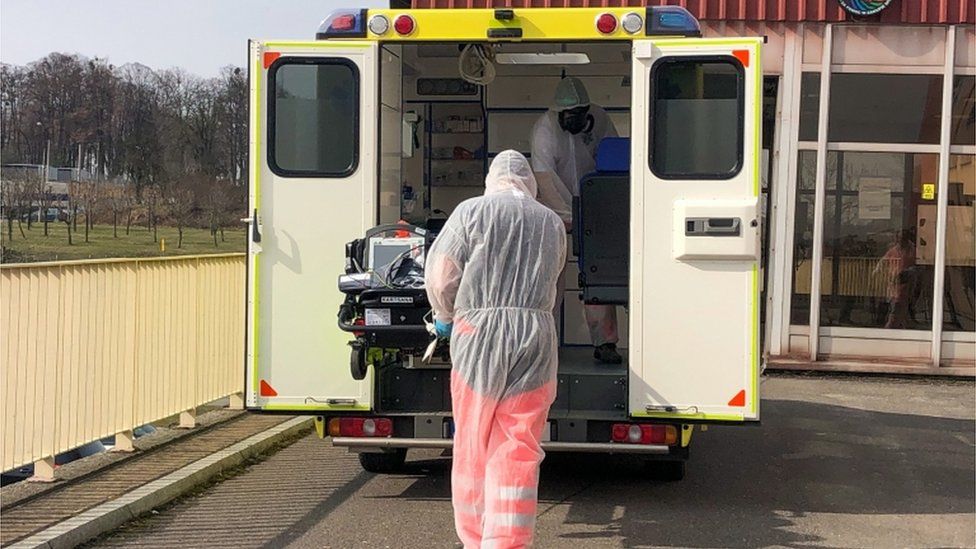 An ambulance brings a patient from the Czech Republic to neighbouring Poland