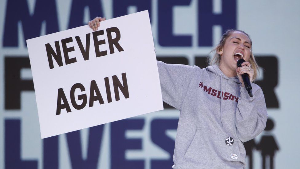 Miley Cyrus sings The Climb during the March For Our Lives rally in Washington, DC, 24 March 2018