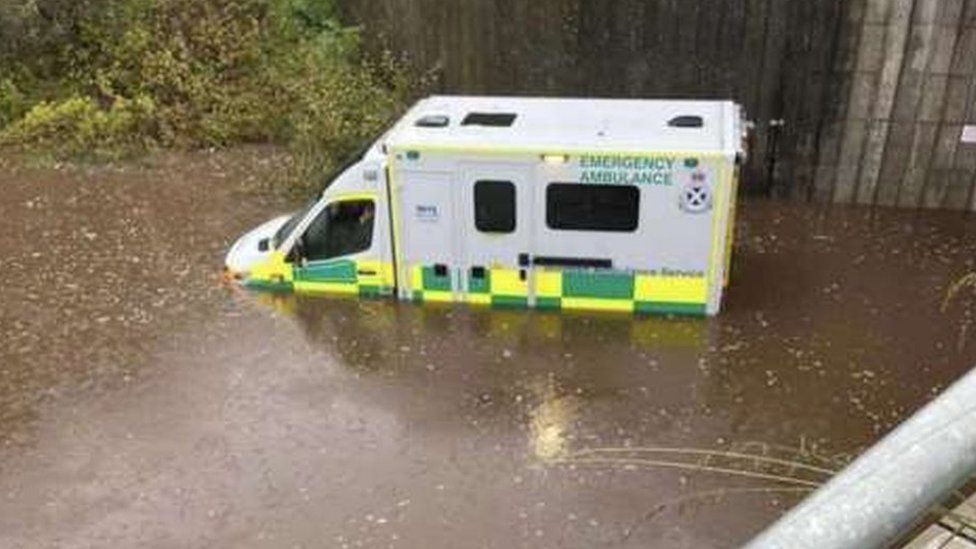 Ambulance in floodwater