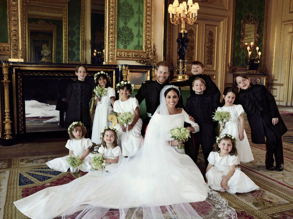 group photograph of Prince Harry and Meghan surrounded by bridesmaids and pageboys