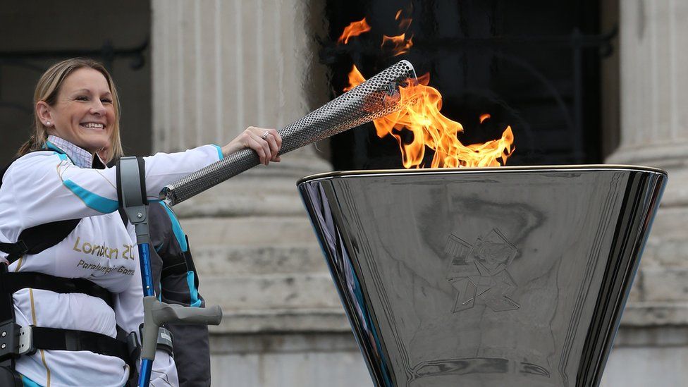 Claire Lomas lights the Olympic cauldron for the Paralympic Games