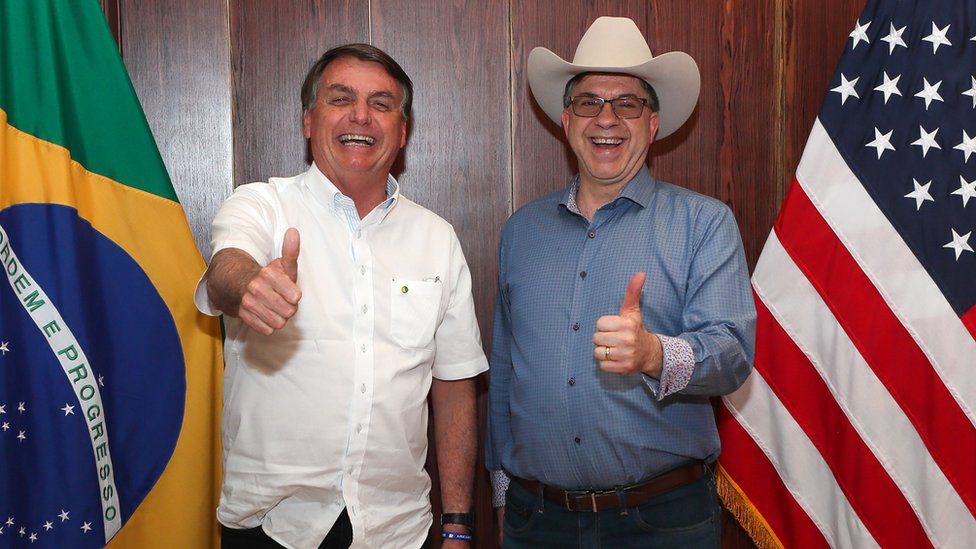 President Jair Bolsonaro (L) and US Ambassador to Brazil Todd Chapman