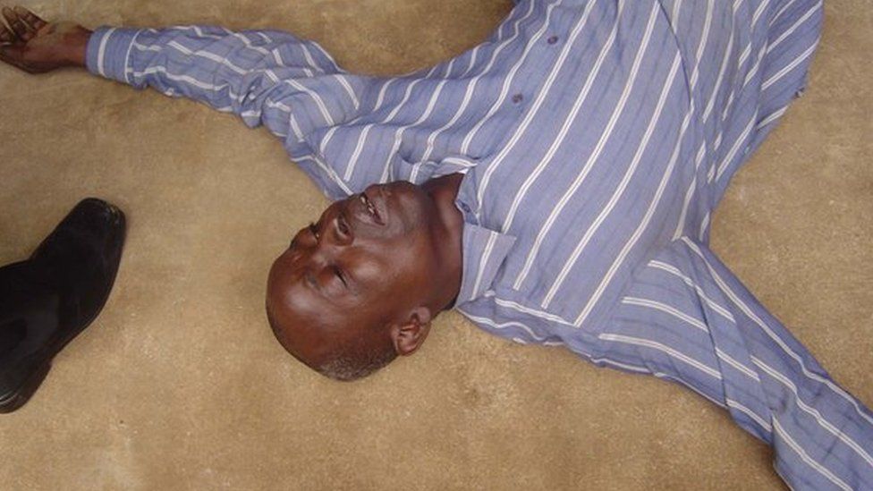 Nigerian man lies on ground during healing session in Lagos in undated picture.