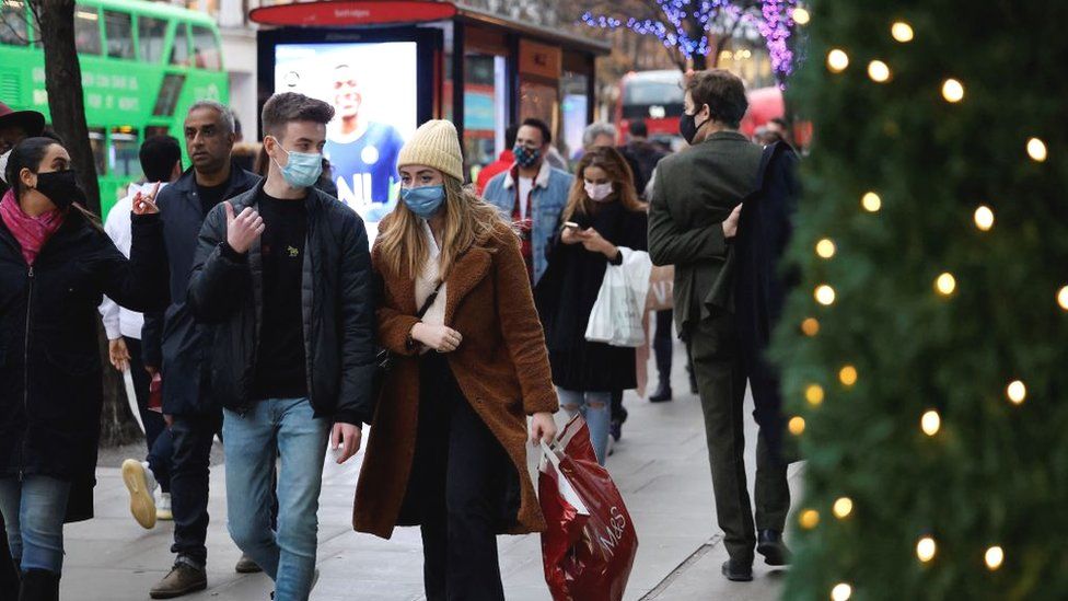 Shoppers wearing face masks on Oxford Street on 18 December 2021