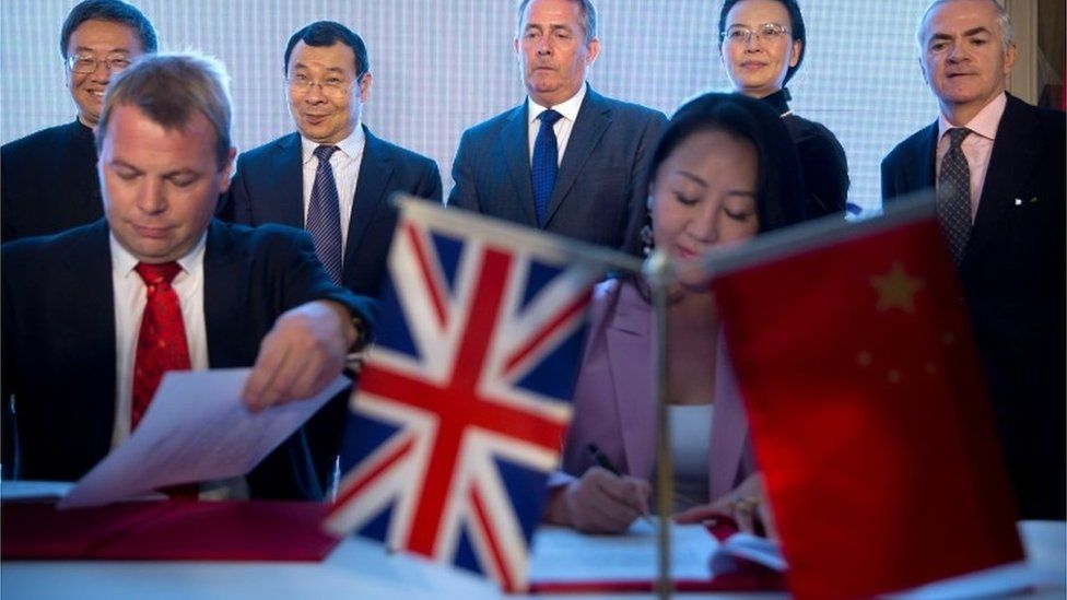 Liam Fox in China signing