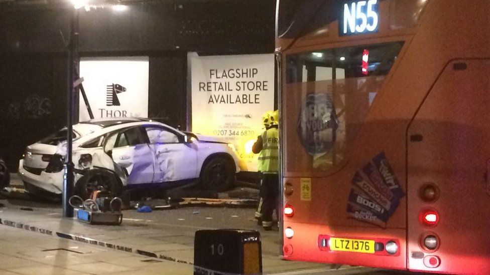 Three hurt as car hits bus and crashes into Oxford Street shop BBC News