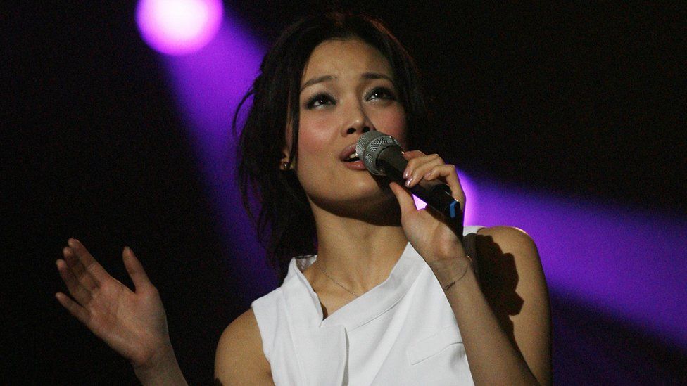 Joey Yung from Hong Kong performs during the Live Earth concert at the Oriental Pearl Tower in Shanghai, 07 July 2007