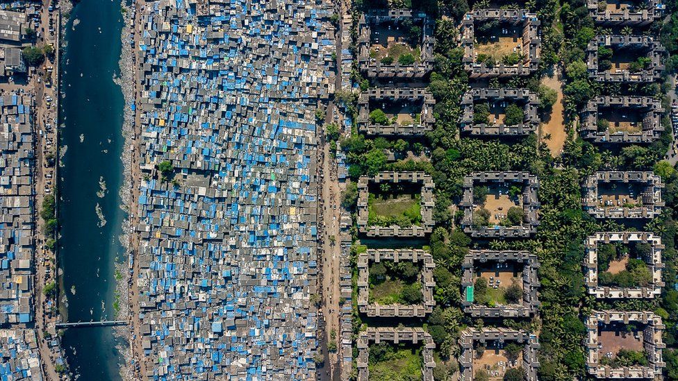 Aerial photos reveal the stark divide between rich and poor - BBC News