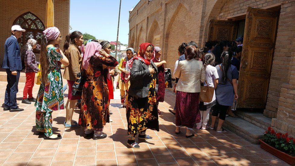 Visitors queuing at the entrance to the Daniyar shrine