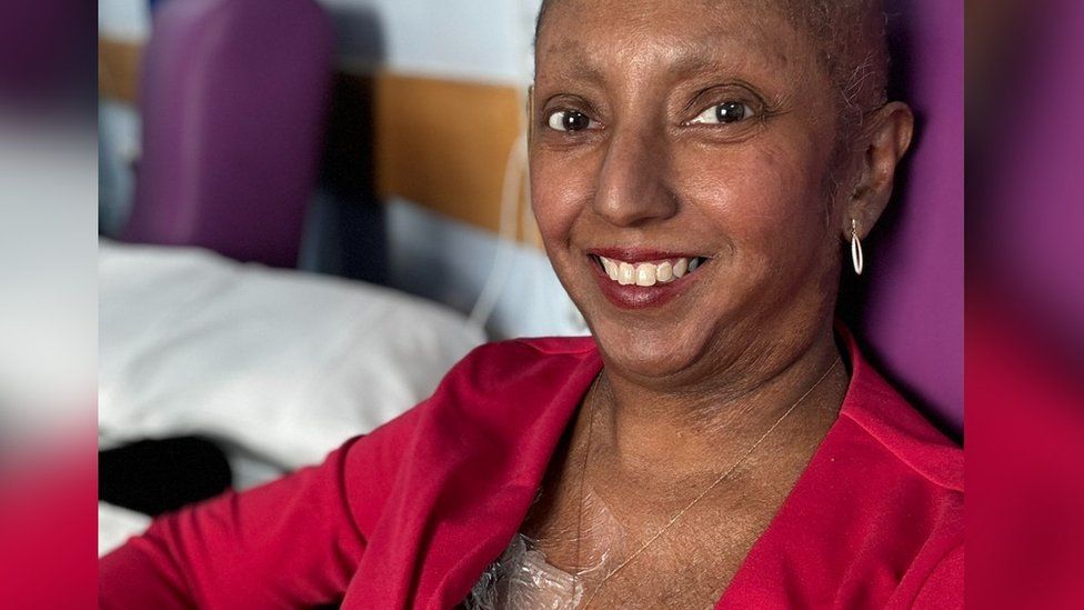 Woman wears dress to chemotherapy treatment