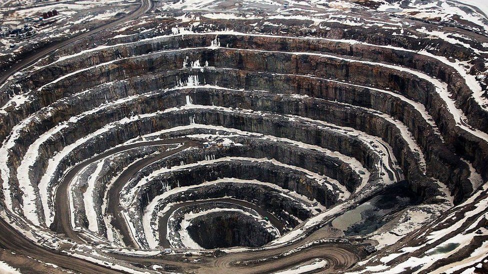 The open pit stands at the Diavik Diamond Mine, owned by Rio Tinto Plc and Dominion Diamond Corp., in the North Slave Region of the Northwest Territories, Canada, on Monday, May 2, 2016.